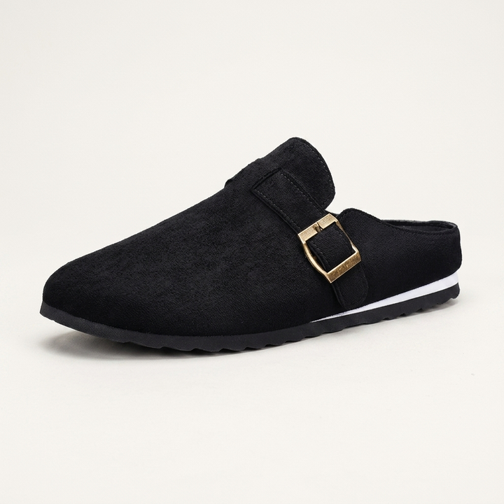 Ragusa Suede Mules — Black, three-quarter studio view