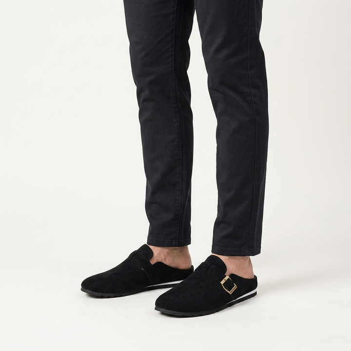 Ragusa Suede Mules — Black, worn on model, studio