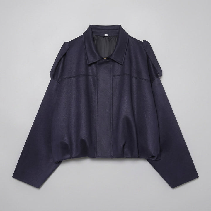 Feltre Suede Jacket — Navy, flat lay front on grey seamless