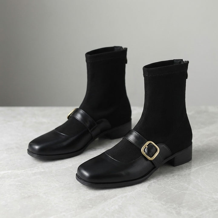 Pesaro Mary Jane Ankle Boots — Black, pair, three-quarter studio view on grey marble