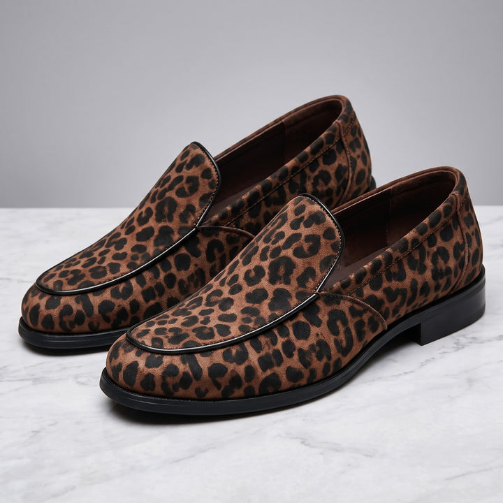 Polignano Leopard Loafers — Brown Leopard, pair in three-quarter view on light-grey marble