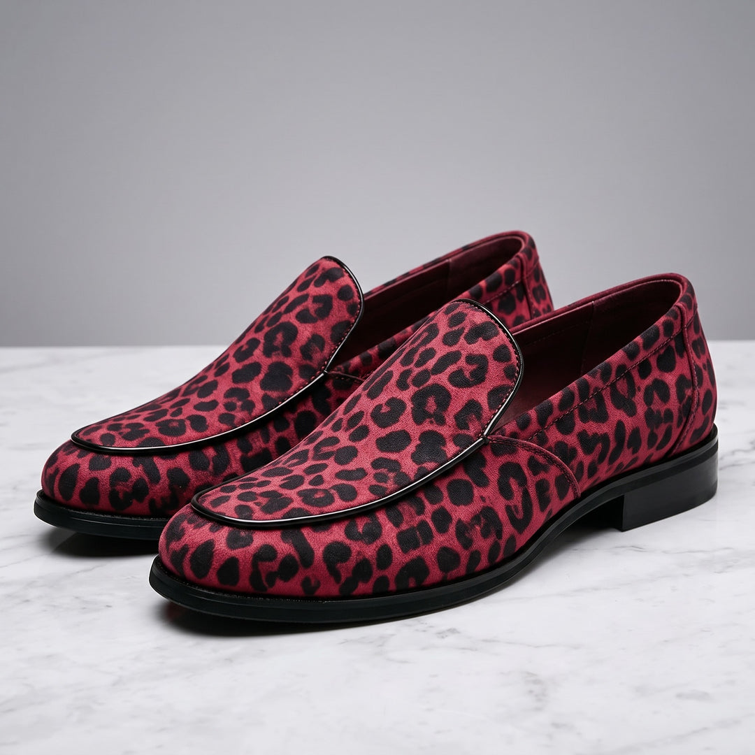 Polignano Leopard Loafers — Red Leopard, pair in three-quarter view on light-grey marble