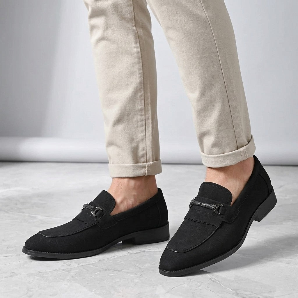 Ragusa Kiltie Bit Loafers — Black, worn on foot, knee-down studio view