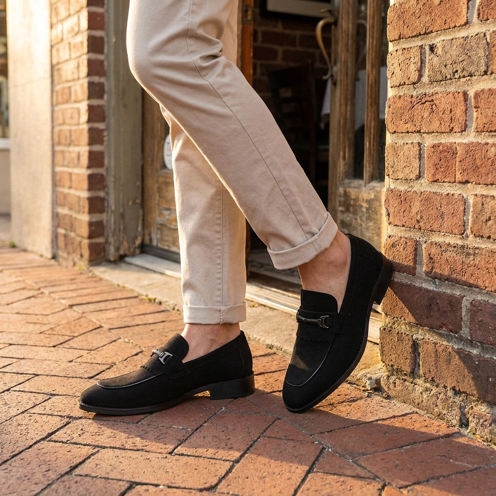Ragusa Kiltie Bit Loafers — Black, worn on foot, outdoor lifestyle view